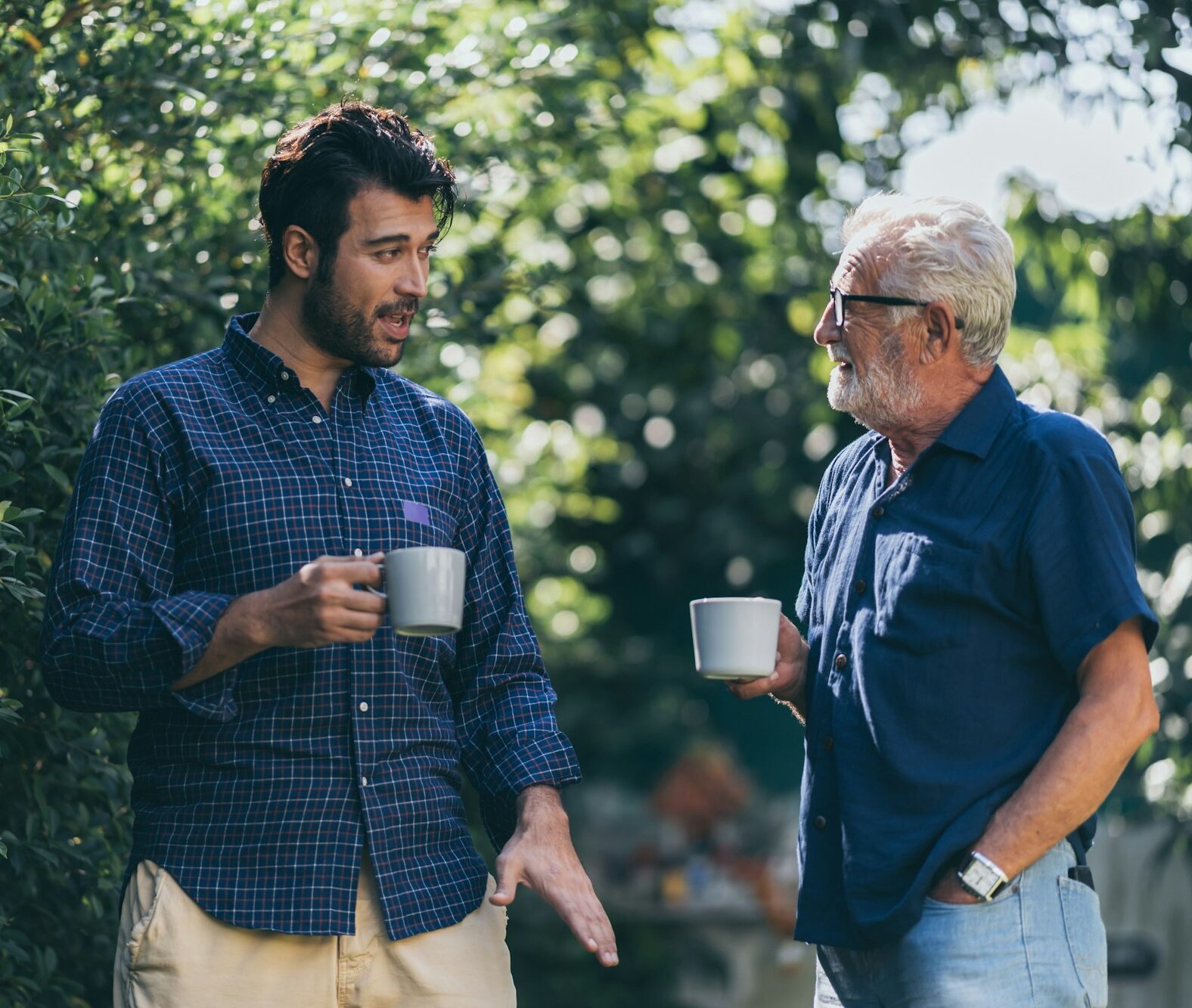 Old father and son, Morning coffee in a garden